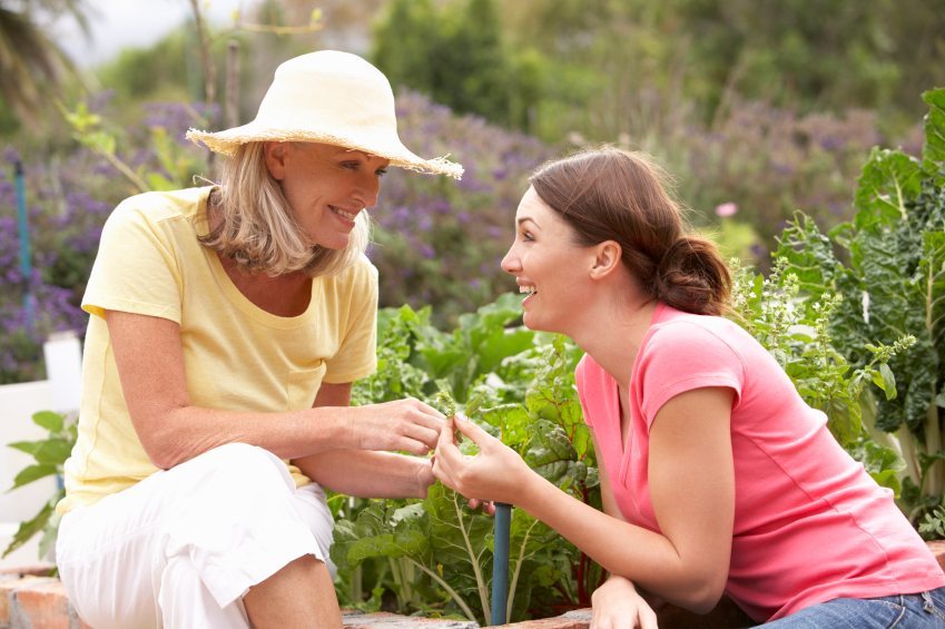 gardening senior mother and daughter