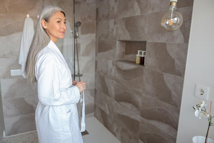 woman entering Easy Step showers