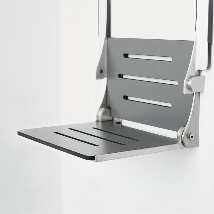 Gray wall mounted shower seat with back and arms-arms fold up seperately