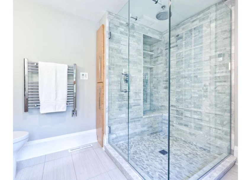 shower pan that has been tiled over