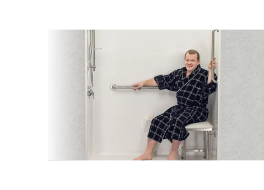man sitting in shower bench seat with folding legs