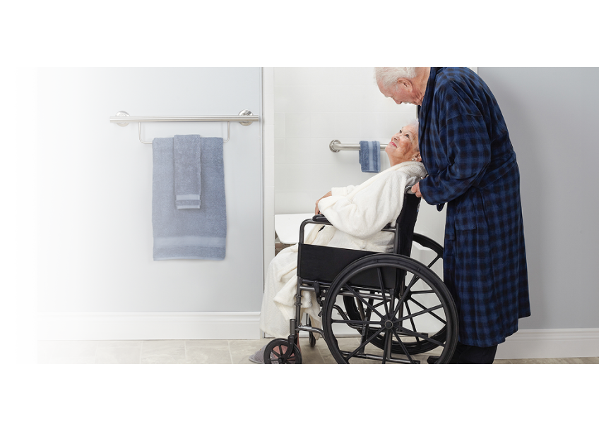 Wheelchair user approaching an ADA transfer shower