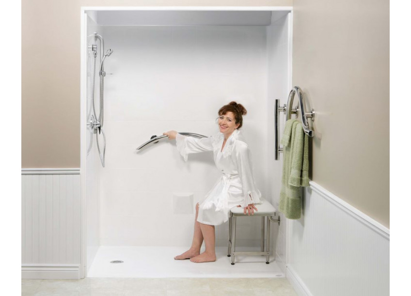 Woman holding a Grab Bar in accessible shower