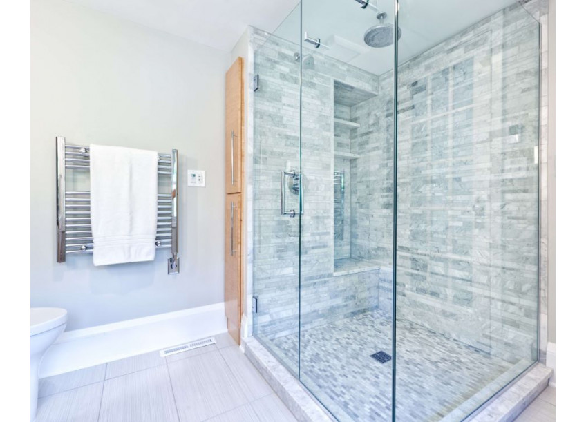 shower pan that has been tiled over