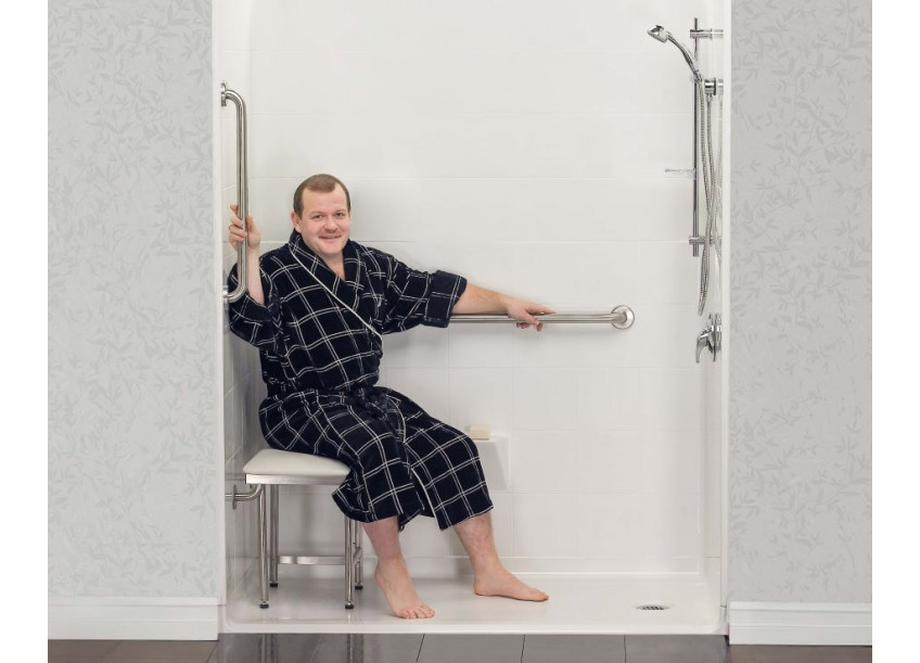 man sitting in shower bench seat with folding legs