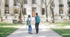 showers for student housing projects students walking towards dorm rooms