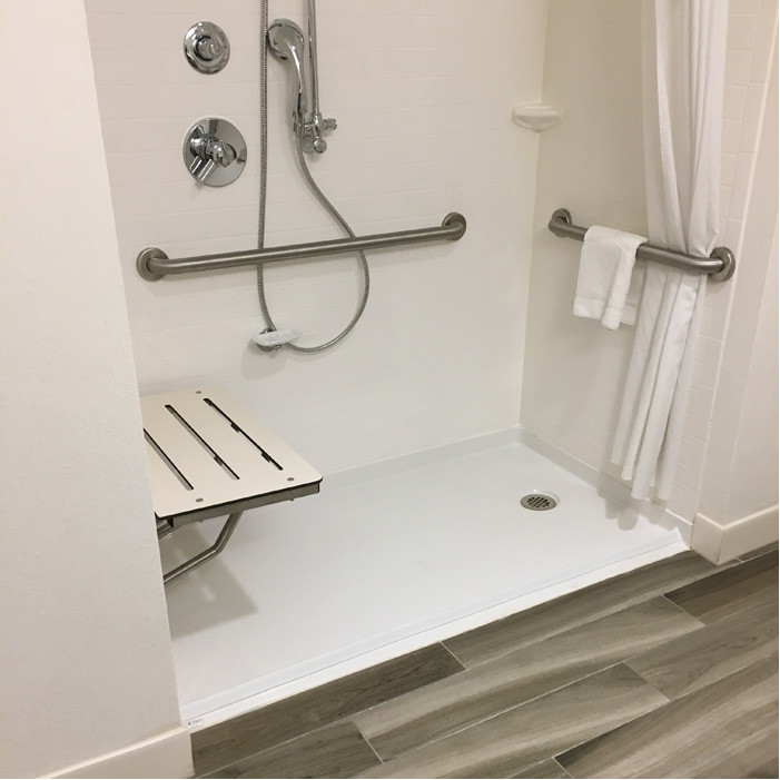 accessible shower pan for a hotel 