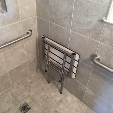 folded up shower seat 