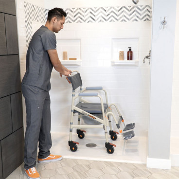 E showerbuddy roll in chair with attendant